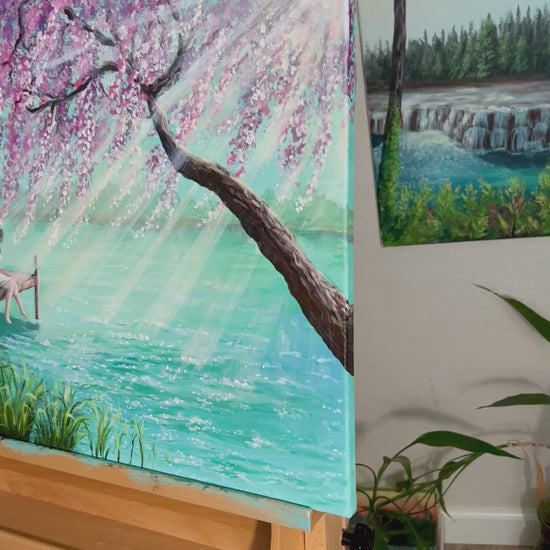 Large bright and romantic landscape painting and a woman sitting on a dock